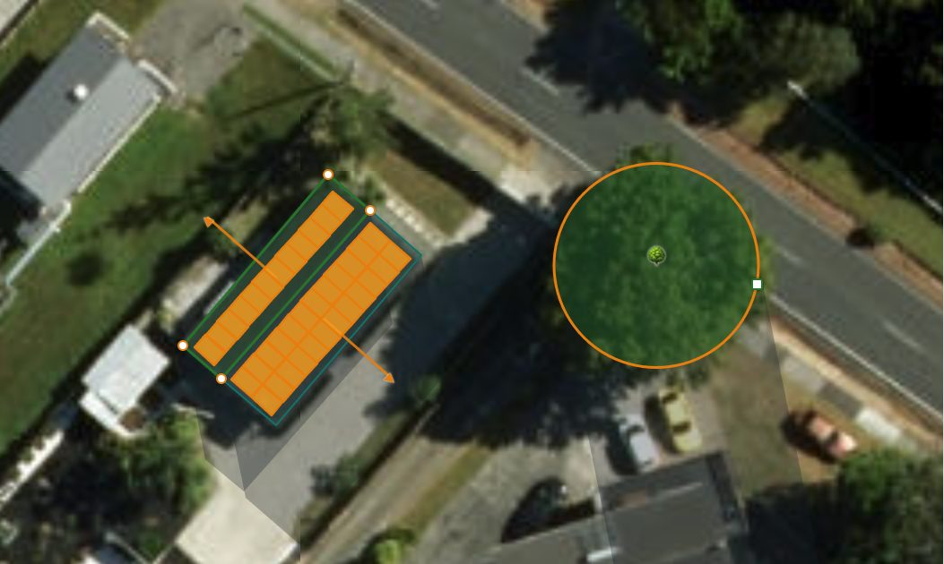 MySolarPlan showing a real roof with solar panels laid out and a tree's winter shadow across the property